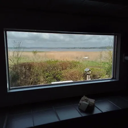 Дом отдыха One-of-a-kind Waterfront Wooden House Hejls