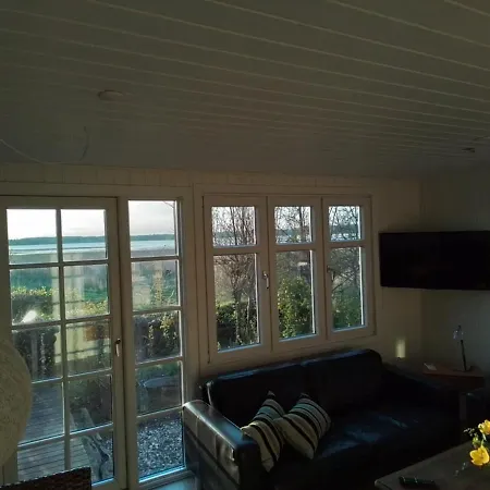 One-of-a-kind Waterfront Wooden House Дом отдыха Hejls