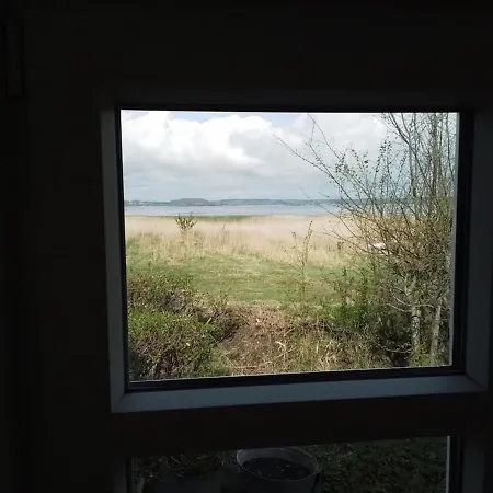 One-of-a-kind Waterfront Wooden House *
