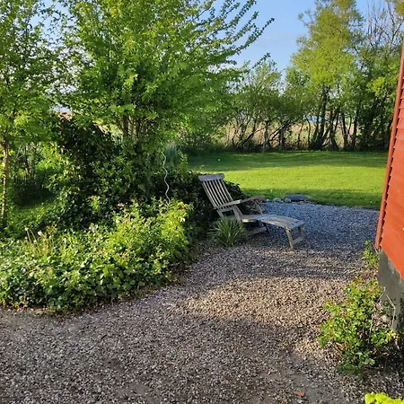 Дом отдыха One-of-a-kind Waterfront Wooden House Hejls