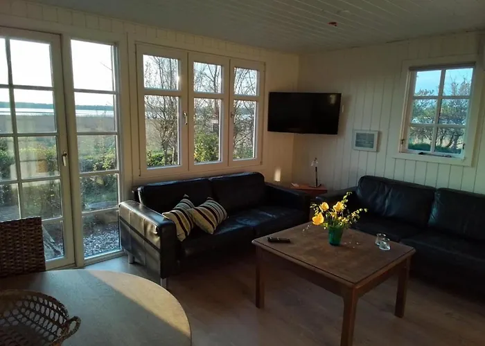 One-of-a-kind Waterfront Wooden House Ferienhaus Hejls